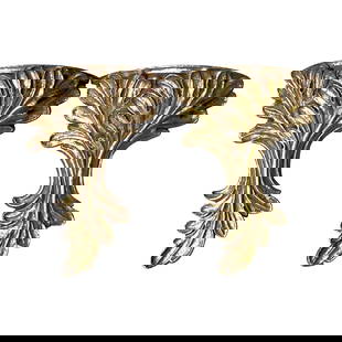 Chic Vintage Regency Gilt Laurel Wall Brackets Pair: Chic Vintage Regency Gilt Laurel Wall Brackets Pair Elevate your decor with this fabulous pair of vintage Regency wall brackets. These chic, hand-carved laurels showcase a stunning silvery gold finish