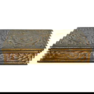Tiffany Studios Gilt Bronze Zodiac Pattern Stamp Box 5.38 x 3.5 x 1: Tiffany Studios Gilt Bronze Zodiac Pattern Stamp Box 5.38 x 3.5 x 1 This exquisite gilt bronze Zodiac pattern stamp box, crafted by Tiffany Studios in New York, dates back to the early 20th century, s