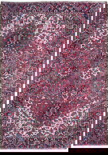 Handcrafted 8'5 x 11'10 Semi-Antique Persian HERIZ Rug: Handcrafted 8'5 x 11'10 Semi-Antique Persian HERIZ Rug Enhance your space with this exquisite 8.5 x 11.10 semi-antique Persian HERIZ rug, handcrafted by skilled Persian artisans. Featuring traditional