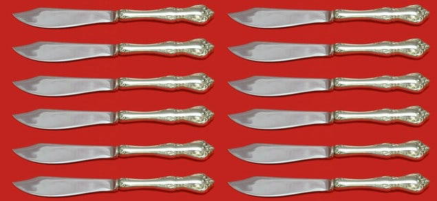 Towle Debussy Sterling Silver Steak Knife Set 12 pcs 8 1/4 in: Towle Debussy Sterling Silver Steak Knife Set 12 pcs 8 1/4 in Enhance your dining experience with this exquisite custom set of 12 steak knives, featuring the elegant Debussy pattern by Towle. Each kni