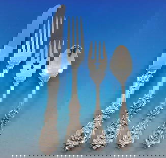 Reed & Barton Francis I 48-Piece Sterling Silver Flatware Set: Reed & Barton Francis I 48-Piece Sterling Silver Flatware Set Discover the elegance of the Francis I flatware set by Reed & Barton, a stunning collection of vintage sterling silver dinnerware. This 48