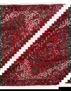Hand-Knotted 9.7 x 11.9 Red Persian Heriz Area Rug: Hand-Knotted 9.7 x 11.9 Red Persian Heriz Area Rug Transform your living space with this exquisite 9.7 x 11.9 Persian hand-knotted Heriz rug. Handcrafted by skilled artisans in Iran, it features tradi