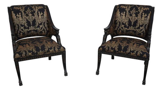 Elegant Black Gold Chinoiserie Armchairs with Egyptian Carved Arms: Elegant Black Gold Chinoiserie Armchairs with Egyptian Carved Arms This exquisite pair of Chinoiserie upholstered armchairs features elegant Egyptian carved arms and intricate carved details that refl