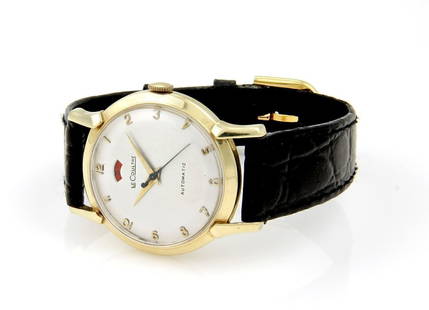 Le Coultre 14k Gold Automatic Men's Watch with Leather Band: Le Coultre 14k Gold Automatic Men's Watch with Leather Band This Le Coultre Automatic Men's Wrist Watch showcases a classic design featuring a luxurious 14k gold case complemented by a sleek black lea