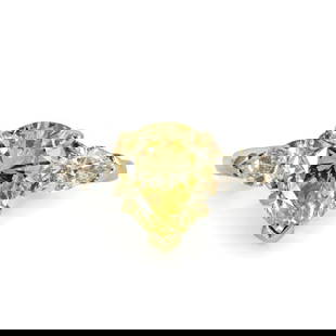 GIA Certified 2.5 Carat Pear Shape Intense Yellow Diamond Three Stone Ring: GIA Certified 2.5 Carat Pear Shape Intense Yellow Diamond Three Stone Ring This stunning three-stone ring features a 2.5 carat pear-shaped natural fancy intense yellow diamond at its center, flanked b