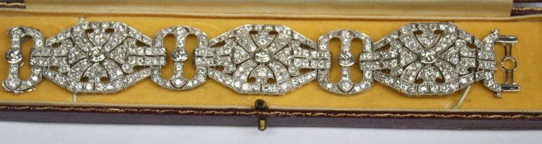 1930s Art Deco Platinum Diamond Bracelet Signed 12ct: 1930s Art Deco Platinum Diamond Bracelet Signed 12ct This exquisite original 1930's Art Deco French bracelet is crafted from platinum and adorned with diamonds totaling 12ct. The bracelet is fully sig