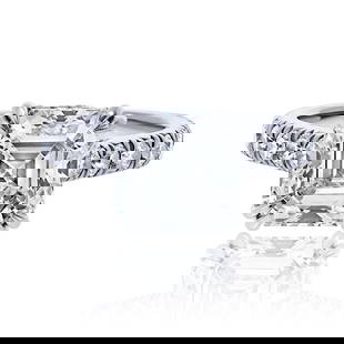 5.01 Carat GIA Certified Asscher Cut Diamond Engagement Ring in Platinum: 5.01 Carat GIA Certified Asscher Cut Diamond Engagement Ring in Platinum This striking engagement ring features a mesmerizing 5.01 carat Asscher cut center diamond certified by GIA as H color and SI1