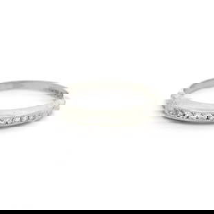 Antique Art Deco Platinum Diamond Channel Set Band Ring: Antique Art Deco Platinum Diamond Channel Set Band Ring This exquisite Antique Art Deco band ring features a delicate design crafted from luxurious platinum. It showcases old single cut diamonds set i