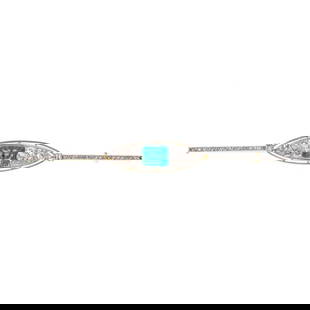 Art Deco 4.80ct Emerald Diamond Brooch in Platinum and 18k Gold: Art Deco 4.80ct Emerald Diamond Brooch in Platinum and 18k Gold This exquisite Art Deco long brooch showcases a captivating design featuring a stunning rectangular-shaped emerald at its center, flanke