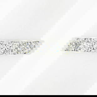 18K White Gold Classic Wedding Band with 1.02ctw Round Pave Diamonds: 18K White Gold Classic Wedding Band with 1.02ctw Round Pave Diamonds This stunning 18K white gold wedding band features a classic polished design adorned with 1.02ctw of round pave diamonds. The brill