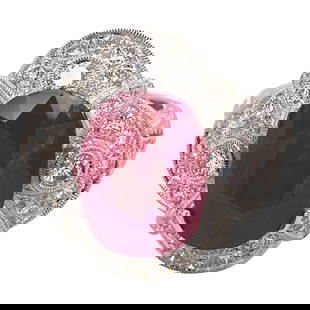 5.12 Carat Oval Cut Ruby Diamond Art Deco Style Ring 18 Karat White Gold: 5.12 Carat Oval Cut Ruby Diamond Art Deco Style Ring 18 Karat White Gold This stunning Art Deco style ring showcases a captivating 5.12 carat oval cut ruby, beautifully complemented by 0.99 carats of