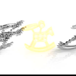 Cartier 18k Two Tone Gold Rocking Horse Charm Pendant 750 J40388: Cartier 18k Two Tone Gold Rocking Horse Charm Pendant 750 J40388 This exquisite charm pendant from Cartier is a delightful collectible piece. Crafted from 18k yellow gold and accented with white gold,