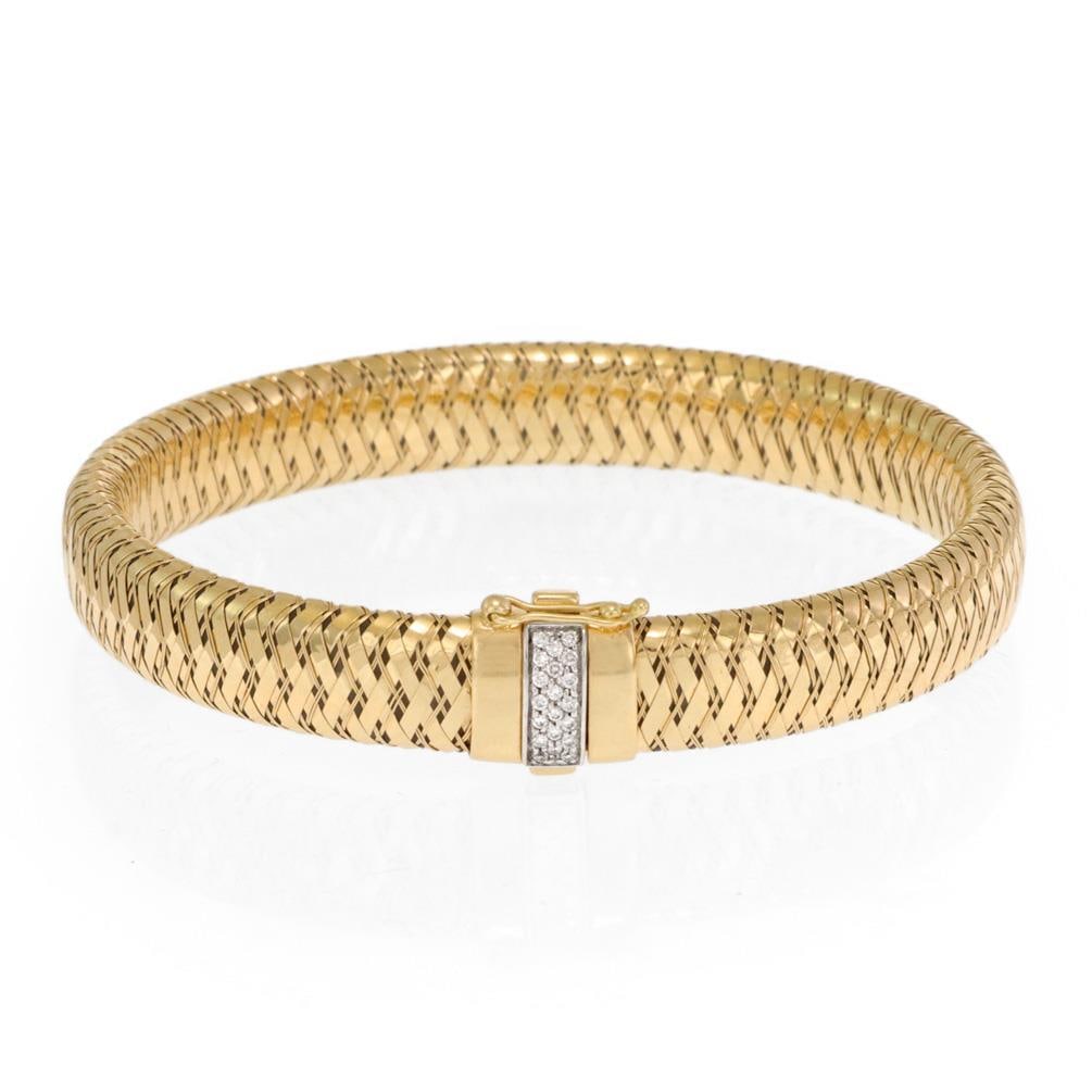 Roberto Coin 18k Gold Diamond Basket Weave Flex Bracelet 10mm: Roberto Coin 18k Gold Diamond Basket Weave Flex Bracelet 10mm This exquisite Roberto Coin bracelet features a stunning basket weave design crafted from 18k yellow gold with a white gold accent. The fl