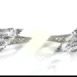 Art Deco Platinum Diamond Ring 1.60 Ct Vintage 7.25: Art Deco Platinum Diamond Ring 1.60 Ct Vintage 7.25 This exquisite Art Deco ring features a stunning 1.60 Ct. diamond set in luxurious platinum. The main diamond exhibits a L color and VVS1 clarity, e