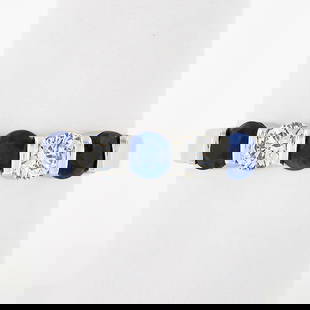 Gemlok Platinum Wedding Band Ring with Blue Sapphire and Diamonds: Gemlok Platinum Wedding Band Ring with Blue Sapphire and Diamonds This exquisite wedding band ring features a stunning design crafted from high-quality platinum. The ring showcases a total carat weigh