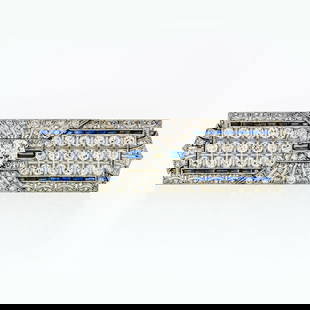 Art Deco Platinum 7.24ctw Diamond Sapphire Filigree Brooch Pin: Art Deco Platinum 7.24ctw Diamond Sapphire Filigree Brooch Pin This stunning Antique Art Deco brooch pin features a remarkable design crafted in platinum, showcasing an impressive total carat weight o