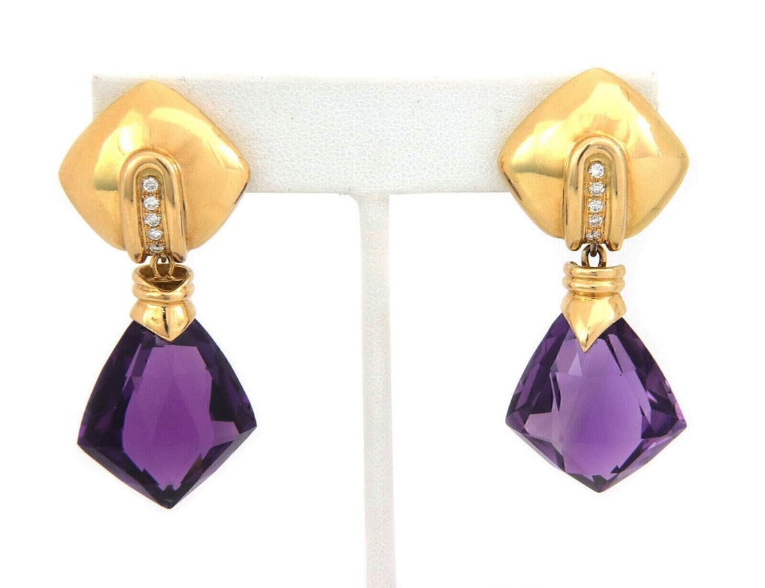 Antonini 18k Gold Amethyst Diamond Rhombus Dangle Earrings: Antonini 18k Gold Amethyst Diamond Rhombus Dangle Earrings Introducing the Antonini Diamond Amethyst 18k Yellow Gold Rhombus Drop Dangle Earrings, a luxurious addition to any fine jewelry collection.