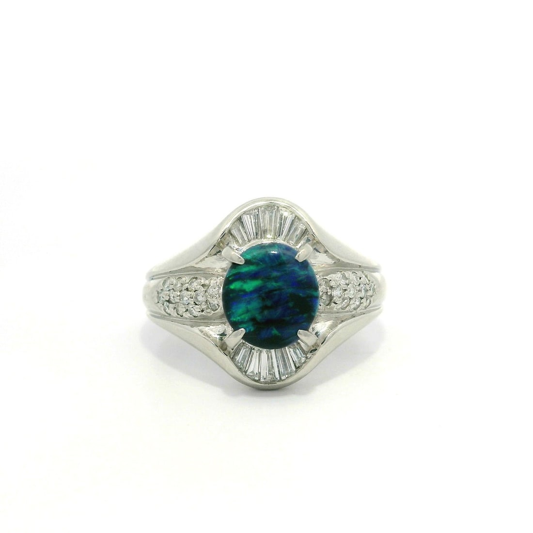 Platinum 2.04ctw Blue Green Black Opal & Diamond Cocktail Ring: Platinum 2.04ctw Blue Green Black Opal & Diamond Cocktail Ring Make a bold statement with this exquisite cocktail ring crafted from solid .900+ platinum. Featuring a stunning 1.66ct natural blue-green