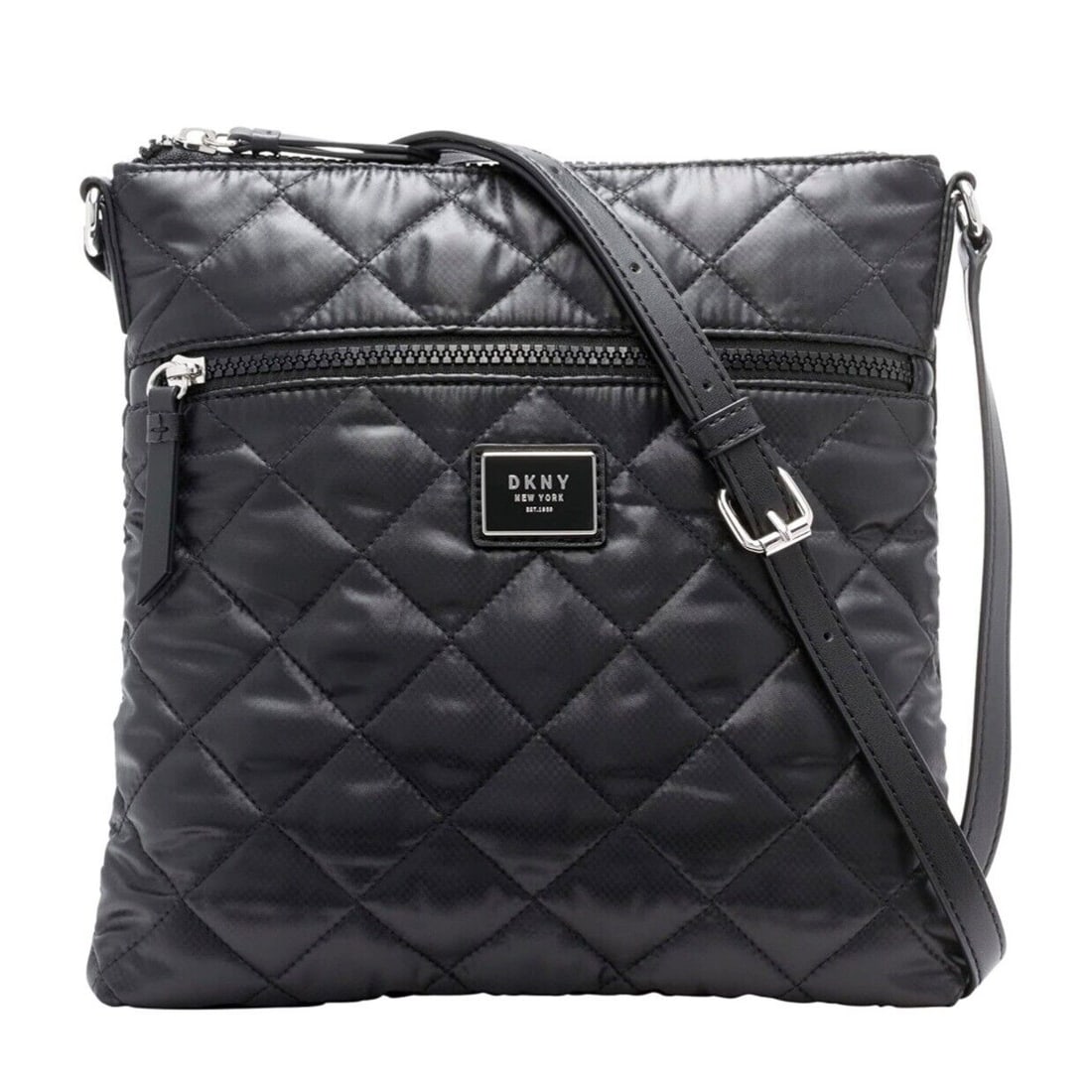 DKNY Maya Black Nylon Quilted Crossbody Bag with Silver Hardware: DKNY Maya Black Nylon Quilted Crossbody Bag with Silver Hardware Elevate your style with the DKNY Maya Zip Front Nylon Crossbody, designed for both functionality and flair. This chic black crossbody f