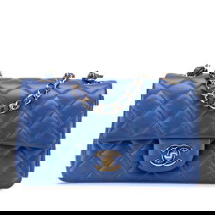 Chanel Mini Rectangular Classic Lambskin Blue Crossbody Bag: Chanel Mini Rectangular Classic Lambskin Blue Crossbody Bag Embrace timeless elegance with the Chanel Mini Rectangular Classic Lambskin Single Flap crossbody bag. Crafted from luxurious quilted lambsk