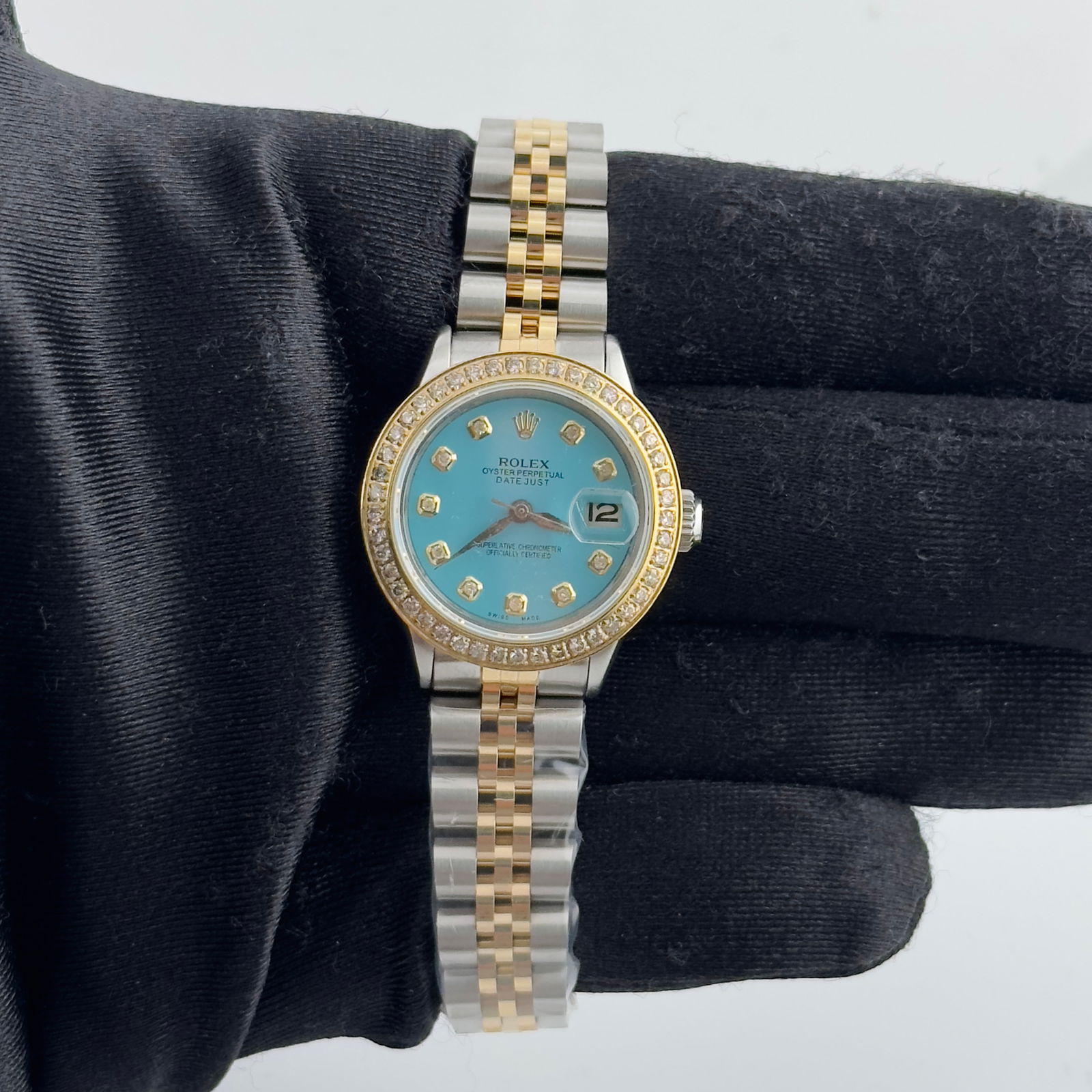 Rolex Datejust Tiffany Blue Dial Jubilee Bracelet Ref 6517: Rolex Datejust Tiffany Blue Dial Jubilee Bracelet Ref 6517 This exquisite Rolex Datejust features a stunning Tiffany Blue dial, perfectly complemented by a pave plated bezel and a luxurious Jubilee br