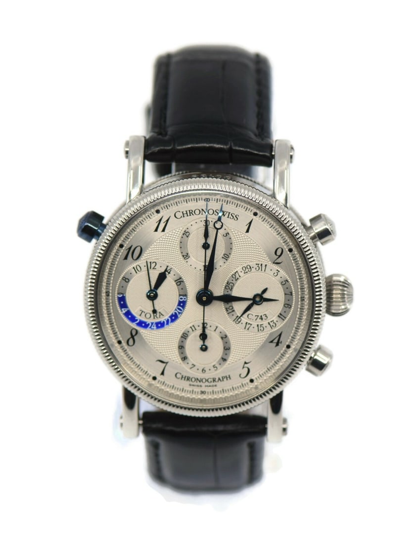 Chronoswiss Tora Chronograph Stainless Steel 38mm Watch CH7423: Chronoswiss Tora Chronograph Stainless Steel 38mm Watch CH7423 This Chronoswiss Tora Chronograph wristwatch features a sleek stainless steel case measuring 38 mm. The watch is powered by a reliable me