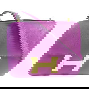 HERMES Constance Mini Shoulder Bag Evercolor Leather Purple: HERMES Constance Mini Shoulder Bag Evercolor Leather Purple Introducing the HERMES Constance Mini Shoulder Bag, crafted from luxurious Evercolor leather in a striking Anemone purple hue. This elegant