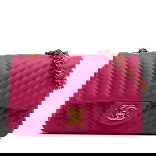 Chanel Mini Rectangular Classic Chevron Lambskin Pink Flap Bag: Chanel Mini Rectangular Classic Chevron Lambskin Pink Flap Bag This Chanel Mini Rectangular Classic Chevron features a beautiful quilted lambskin leather body in a stunning pink hue. The bag is design