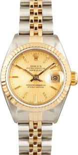 Rolex Datejust 69173 Ladies Watch Gold Tapestry Dial Jubilee Bracelet: Rolex Datejust 69173 Ladies Watch Gold Tapestry Dial Jubilee Bracelet This exquisite Rolex Datejust wristwatch features a stunning gold tapestry dial, elegantly set within a 26mm case. The watch is de