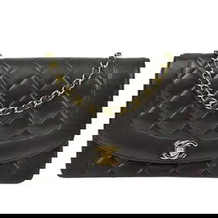 Chanel Black Lambskin Diana Medium Shoulder Bag with Flap Turnlock: Chanel Black Lambskin Diana Medium Shoulder Bag with Flap Turnlock Elevate your style with the Chanel Black Lambskin Medium Diana Shoulder Bag. This sophisticated shoulder bag features a classic quilt