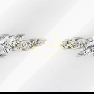 Antique Art Deco 18k White Gold 0.53ct Diamond Engagement Ring with Engraved Sides: Antique Art Deco 18k White Gold 0.53ct Diamond Engagement Ring with Engraved Sides This exquisite antique engagement ring showcases an elegant Art Deco design crafted from solid 18k white gold. Featur