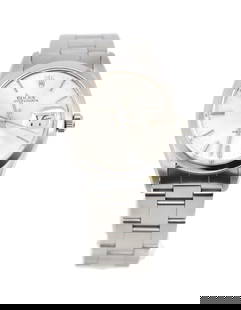 Rolex Oyster Date Stainless Steel Wristwatch Model 6694 Authentic with Box: Rolex Oyster Date Stainless Steel Wristwatch Model 6694 Authentic with Box Presenting a classic Rolex Oyster Date wristwatch, model 6694, crafted from durable stainless steel. This elegant timepiece f