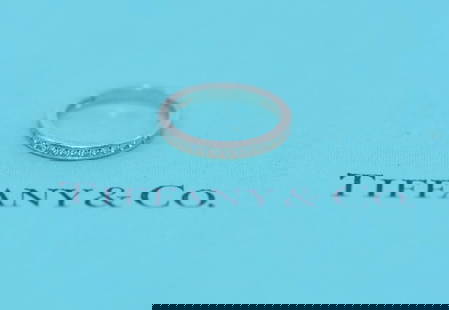 Tiffany & Co Full Circle Diamond Platinum Wedding Band Ring 0.40 CTW Size 5: Tiffany & Co Full Circle Diamond Platinum Wedding Band Ring 0.40 CTW Size 5 This exquisite Tiffany & Co. Full Circle Diamond Platinum Wedding Band Ring is a timeless piece perfect for celebrating love