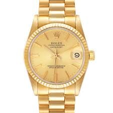 Rolex Datejust Ladies 18k Gold Dial President Ref 68278: Rolex Datejust Ladies 18k Gold Dial President Ref 68278 This exquisite Ladies Rolex Datejust features a stunning gold dial and is elegantly set on a fluted bezel. The watch, with reference number 6827