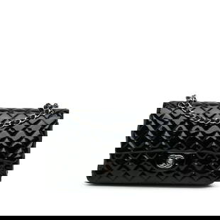 Chanel Medium Classic Patent Double Flap Black Leather Shoulder Bag: Chanel Medium Classic Patent Double Flap Black Leather Shoulder Bag This Chanel Medium Classic Patent Double Flap shoulder bag showcases a luxurious quilted patent leather body in elegant black. Desig
