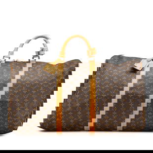 Louis Vuitton Monogram Keepall 60 Iconic Travel Bag: Louis Vuitton Monogram Keepall 60 Iconic Travel Bag The Louis Vuitton Monogram Keepall 60 is an iconic travel bag crafted from durable monogram canvas, featuring refined vachetta leather trim and roll