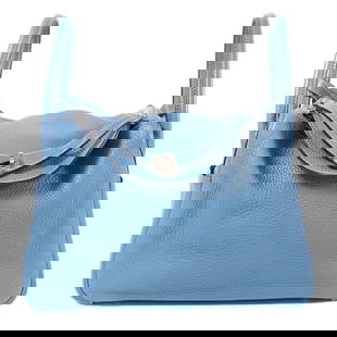 HERMES Lindy 30 2 Way Shoulder Bag Bleu Jean Taurillon Leather: HERMES Lindy 30 2 Way Shoulder Bag Bleu Jean Taurillon Leather The HERMES Lindy 30 2 Way Shoulder Bag is a stylish and functional accessory crafted from soft Taurillon Clemence leather in a stunning B