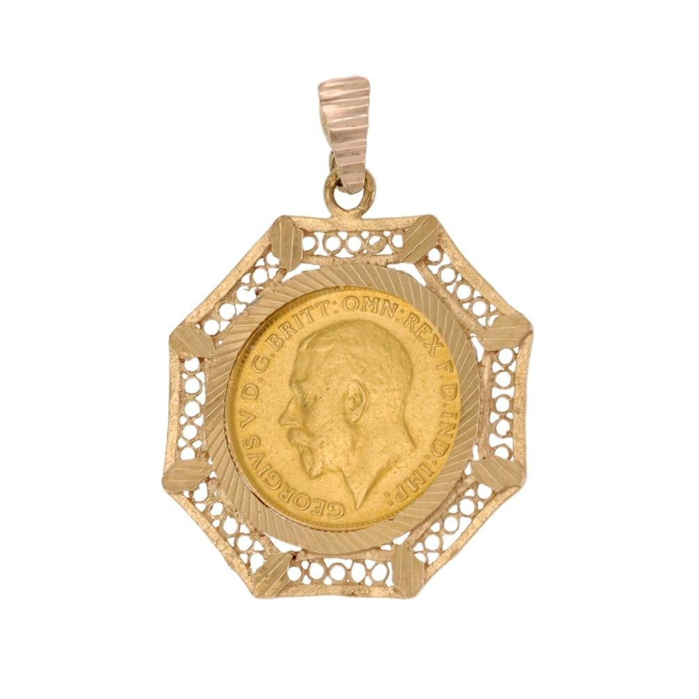 Great Britain 20k Gold Sovereign Coin in 18k Filigree Pendant: Great Britain 20k Gold Sovereign Coin in 18k Filigree Pendant This exquisite pendant features a stunning Great Britain Gold Sovereign coin from 1913, showcasing the portrait of King George V. The coin