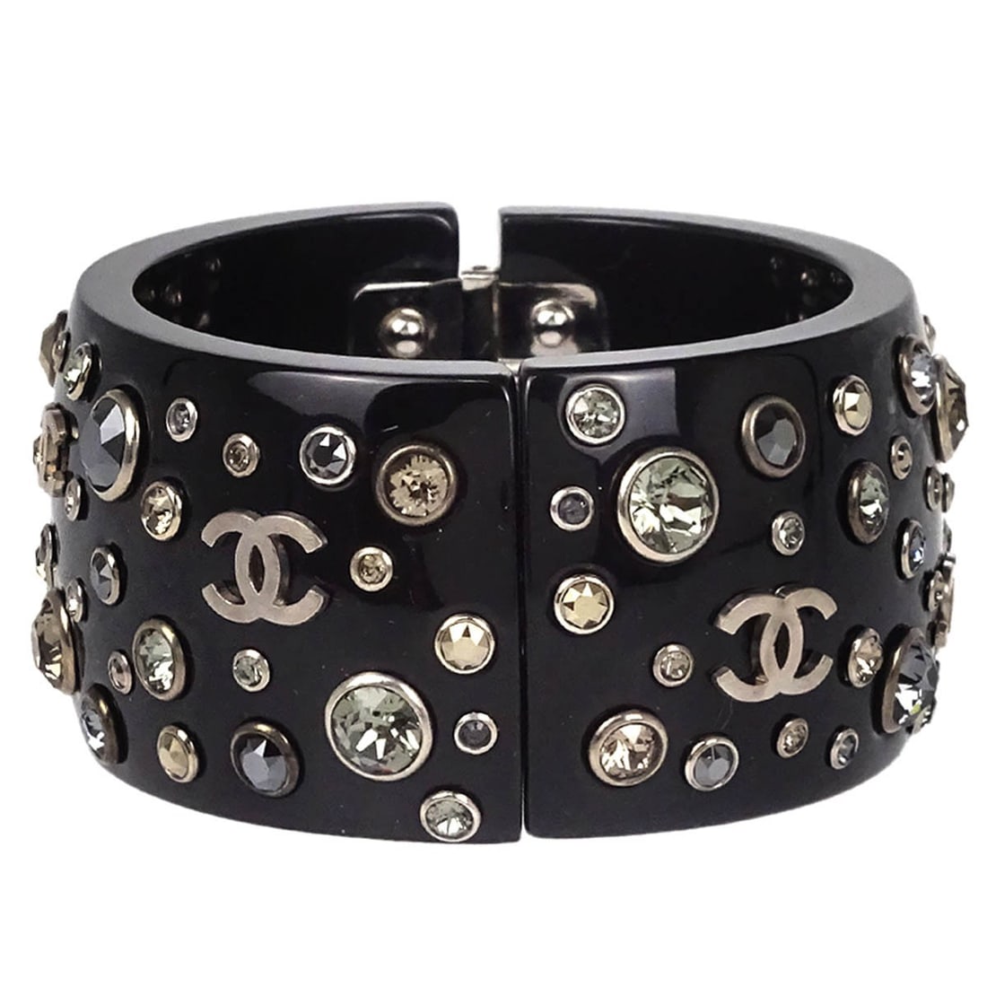 Chanel Black Rhinestone Bangle Bracelet Acrylic 13B: Chanel Black Rhinestone Bangle Bracelet Acrylic 13B This elegant Chanel bangle bracelet features a striking black color and is adorned with rhinestones for a touch of sparkle. Crafted from acrylic, th