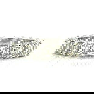 Platinum Eternity Band with 22 Emerald-cut Diamonds 6.50 Ct: Platinum Eternity Band with 22 Emerald-cut Diamonds 6.50 Ct This exquisite Platinum Eternity Band features 22 stunning emerald-cut diamonds, totaling approximately 6.50 Ct. The diamonds are carefully