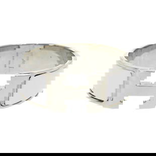Hermes Click Clack GM Bangle Bracelet White Silver H Motif 2012: Hermes Click Clack GM Bangle Bracelet White Silver H Motif 2012 This elegant Hermes Click Clack GM bangle bracelet features a striking H motif in a silver and white color combination. Crafted in Franc