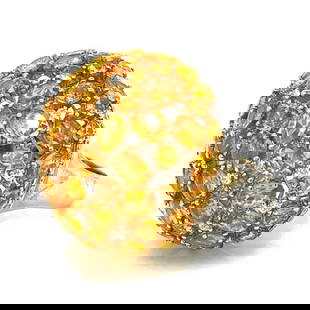 Elegant 18K White Gold Yellow Sapphire and Diamond Ring: Elegant 18K White Gold Yellow Sapphire and Diamond Ring This stunning 18K White Gold ring features a captivating array of yellow sapphires and sparkling diamonds. The ring weighs 26.6 grams and is ado