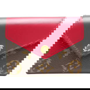 Louis Vuitton Monogram Zoe Wallet M62932 Fuchsia Women's Tri-Fold: Louis Vuitton Monogram Zoe Wallet M62932 Fuchsia Women's Tri-Fold Introducing the Louis Vuitton Monogram Zoe Wallet M62932, a stylish tri-fold wallet designed for women. This exquisite piece features