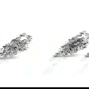 14K White Gold Diamond Stud Earrings 1.22 Ct G-H SI2-I1: 14K White Gold Diamond Stud Earrings 1.22 Ct G-H SI2-I1 Elevate your elegance with these stunning 14K White Gold Diamond Stud Earrings. Each earring features two brilliant diamonds, totaling approxima