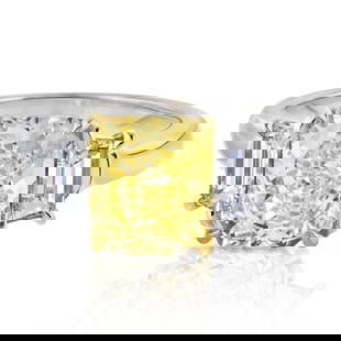 3.21ct Radiant Cut Fancy Intense Yellow Diamond Engagement Ring in Platinum & 18K Yellow Gold: 3.21ct Radiant Cut Fancy Intense Yellow Diamond Engagement Ring in Platinum & 18K Yellow Gold A stunning three-stone engagement ring featuring a captivating 3.21 carat radiant cut fancy intense yellow