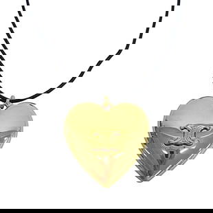 CELINE Gold Triomphe Heart Pendant Necklace for Women: CELINE Gold Triomphe Heart Pendant Necklace for Women Introducing the CELINE Triomphe Heart Motif Pendant Necklace, a stunning accessory designed for women. Crafted in a luxurious gold color, this pen