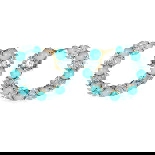 Etho Maria 18k White Gold Yellow Gold Turquoise Blue Topaz Hoop Earrings: Etho Maria 18k White Gold Yellow Gold Turquoise Blue Topaz Hoop Earrings These stunning hoop earrings combine the elegance of white gold and yellow gold with vibrant turquoise and blue topaz stones. W