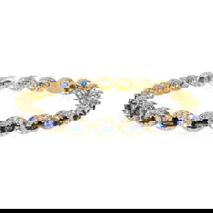 14K Yellow Gold Diamond Sapphire Tennis Bracelet 5.56 CTW: 14K Yellow Gold Diamond Sapphire Tennis Bracelet 5.56 CTW This exquisite Diamond & Sapphire Linked Ovals Bracelet is crafted from luxurious 14K yellow gold, showcasing a stunning total carat weight of