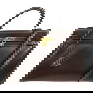 Hermes Kelly 35 Retourne 2way Handbag Brown Leather Togo Gold Hardware: Hermes Kelly 35 Retourne 2way Handbag Brown Leather Togo Gold Hardware The Hermes Ebene Box Calf Amazonia Kelly 35 Retourne 2way Handbag is a luxurious medium-sized handbag crafted from high-quality l
