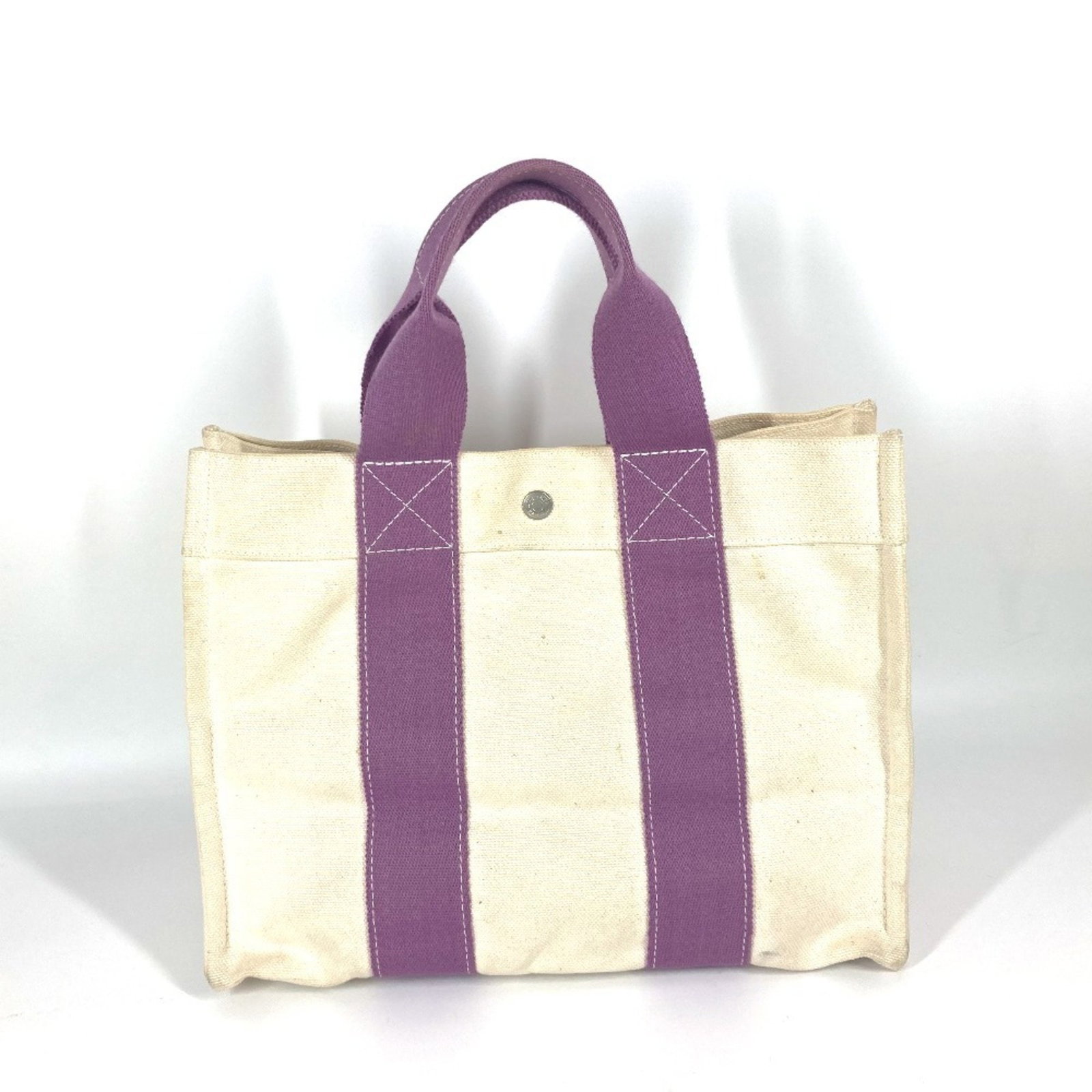 HERMES Bora PM Tote Bag Canvas Purple Unisex Handbag: HERMES Bora PM Tote Bag Canvas Purple Unisex Handbag This HERMES Bora PM Handbag Tote is a versatile accessory designed for both men and women. Crafted from durable canvas, it features a striking comb